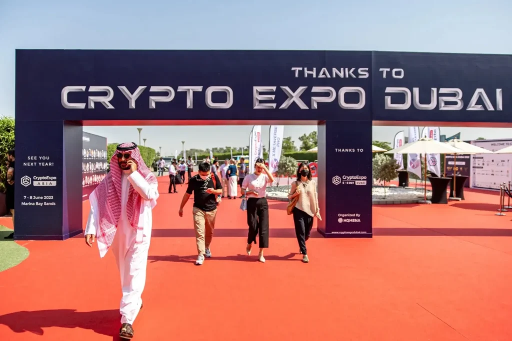Crypto Expo Dubai entrance with attendees arriving at the event venue.
