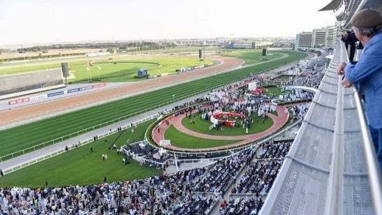 Spectators overlooking Meydan Racecourse during the Dubai Racing Carnival.