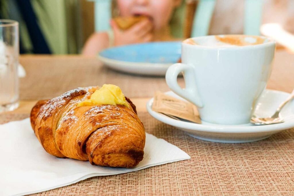 breakfast of pastry and coffee