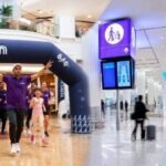 Participants take part in the Dubai Mallathon inside an air conditioned shopping mall, using the indoor walking track as part of Dubai's summer fitness initiative.