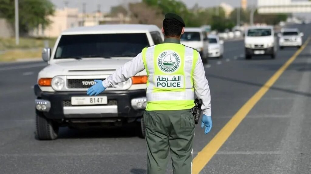 traffic police stopping a car in UAE