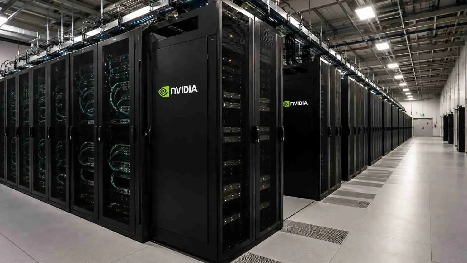 Modern AI data center with rows of high performance server racks and Nvidia powered infrastructure representing Abu Dhabi's sovereign AI expansion.